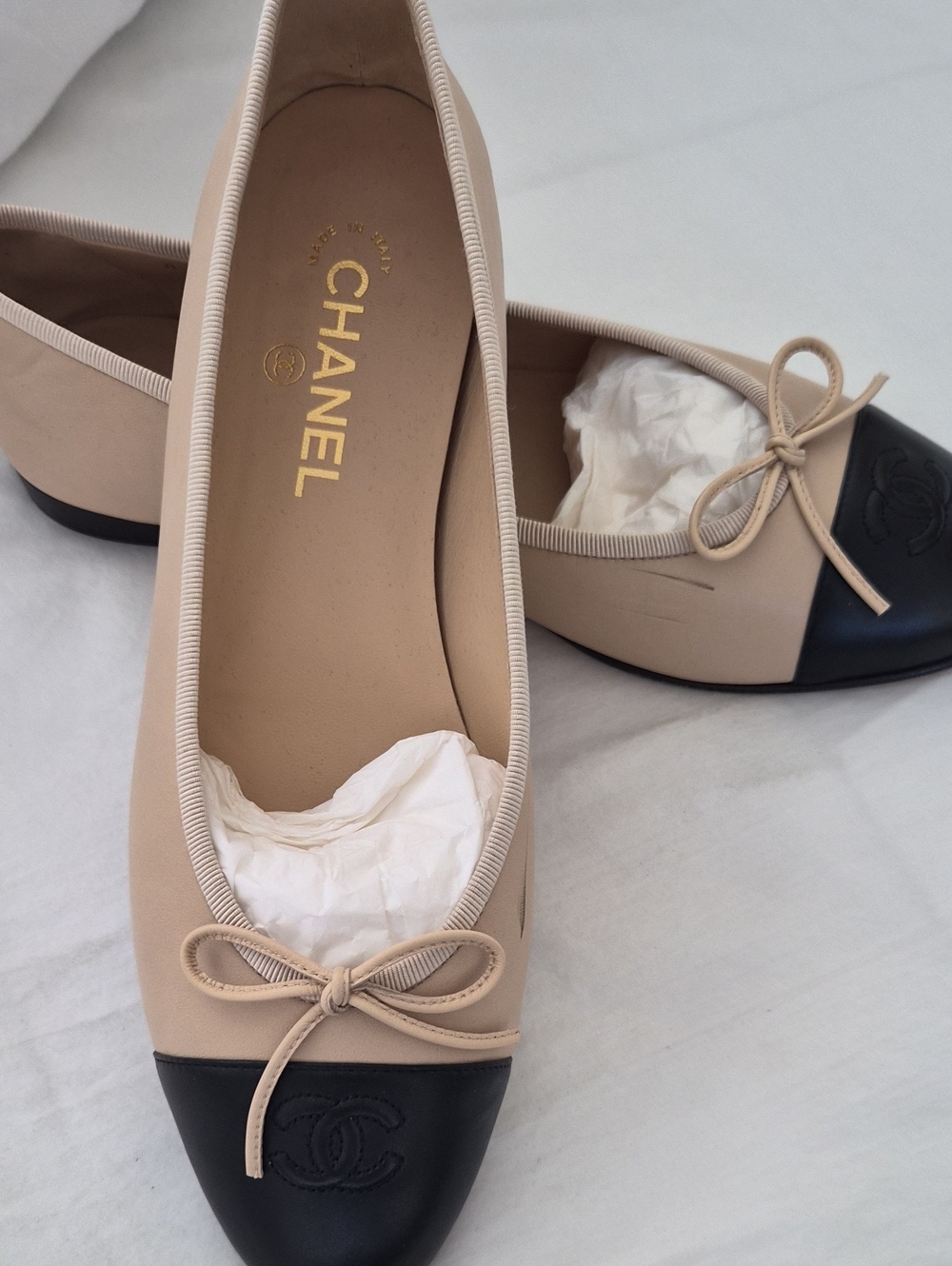 CHANEL Two-Tone Beige and Black Cap-Toe Ballet Flats
